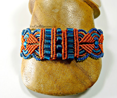 Micro macrame bracelet in orange and blue by Sherri Stokey.