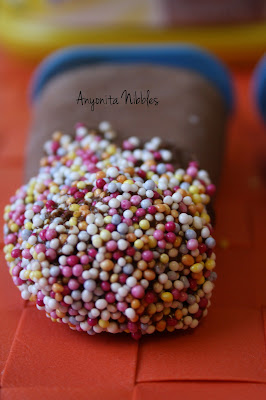 A three-ingredient Nesquick and Nutella Popsicle Dressed in Sugar Dots from www.anyonita-nibbles.com