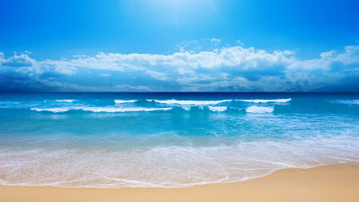 QUIERO UNA IMAGEN  - Página 9 Fotograf%C3%ADa+muy+bonita+de+el+mar+azul+y+la+arena+ba%C3%B1ada+por+el+sol