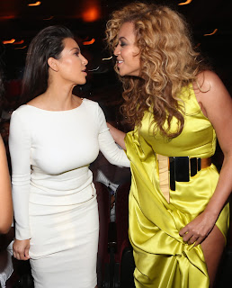 Kim Kardashian and Beyonce about to kiss