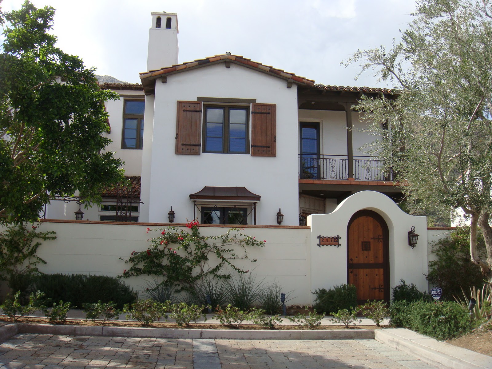 Rustic Spanish Shutters Designed and Crafted to Suite this Spanish