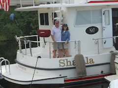 Jerry and Theresa with SHA LA LA (say 'shuh lay la) rafted at the Dismal Swamp.