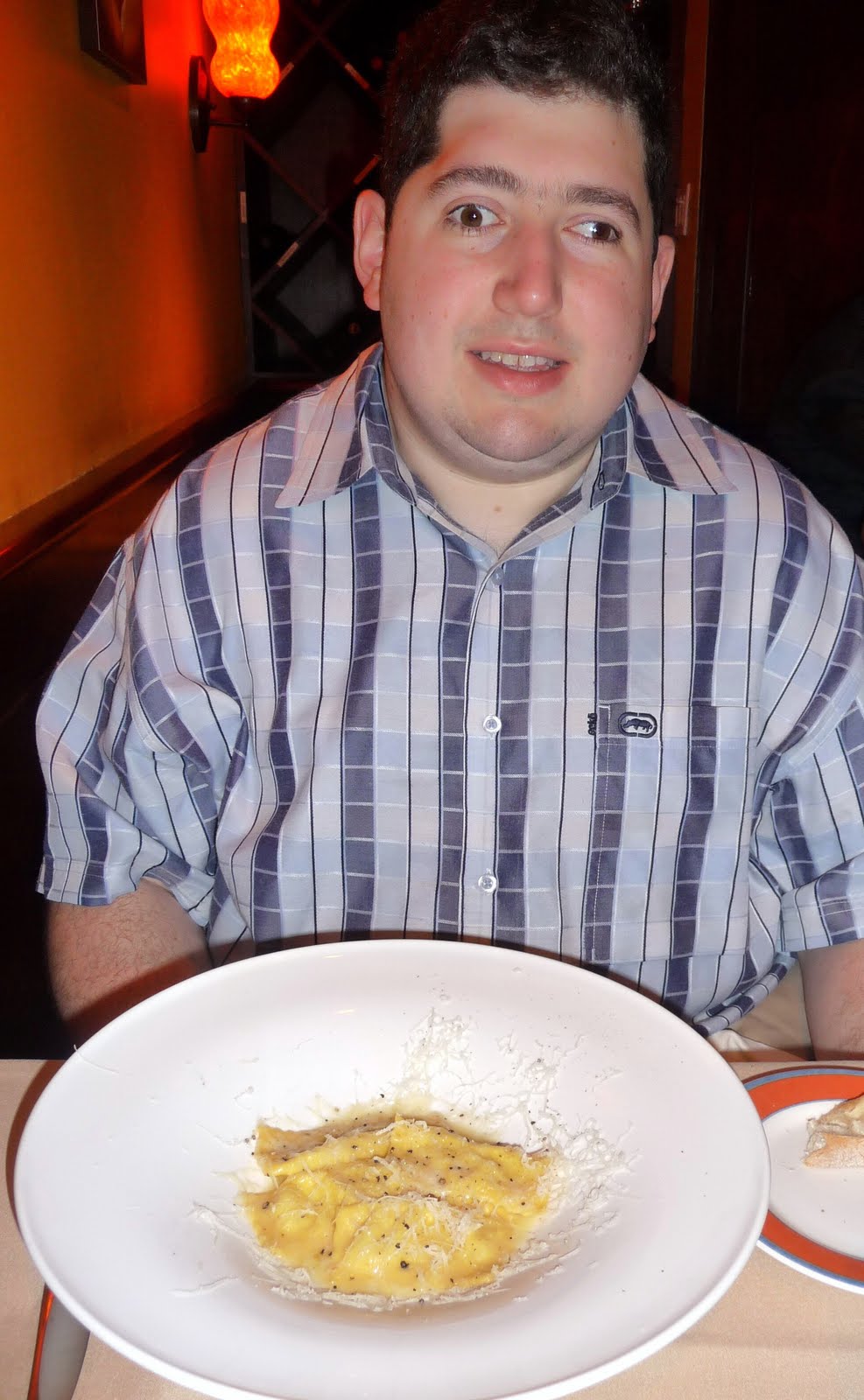 Daniel Aronoff sitting across the table from me at Felidia, waiting to taste his pecorino ravioli