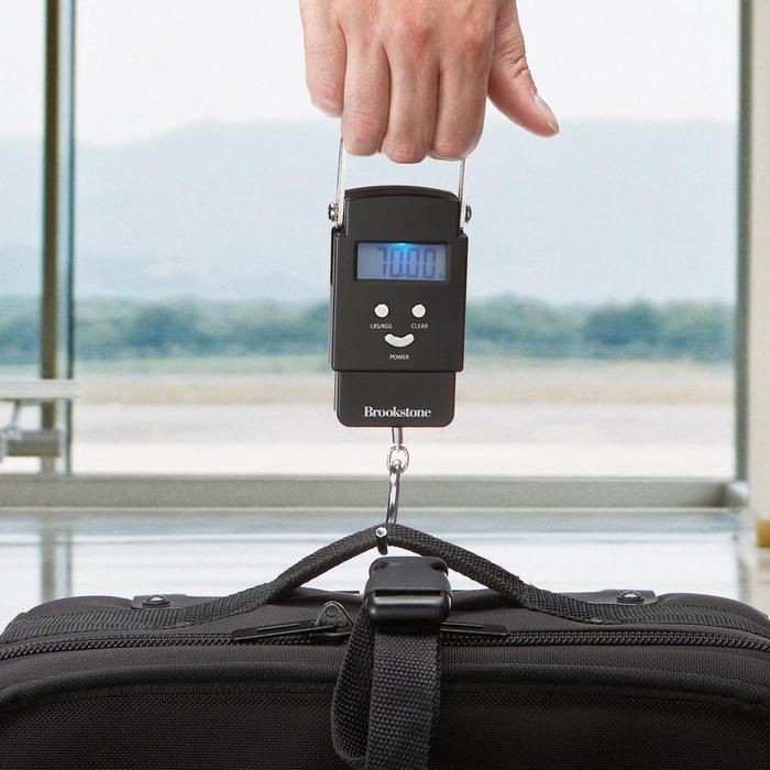 weighing hand luggage