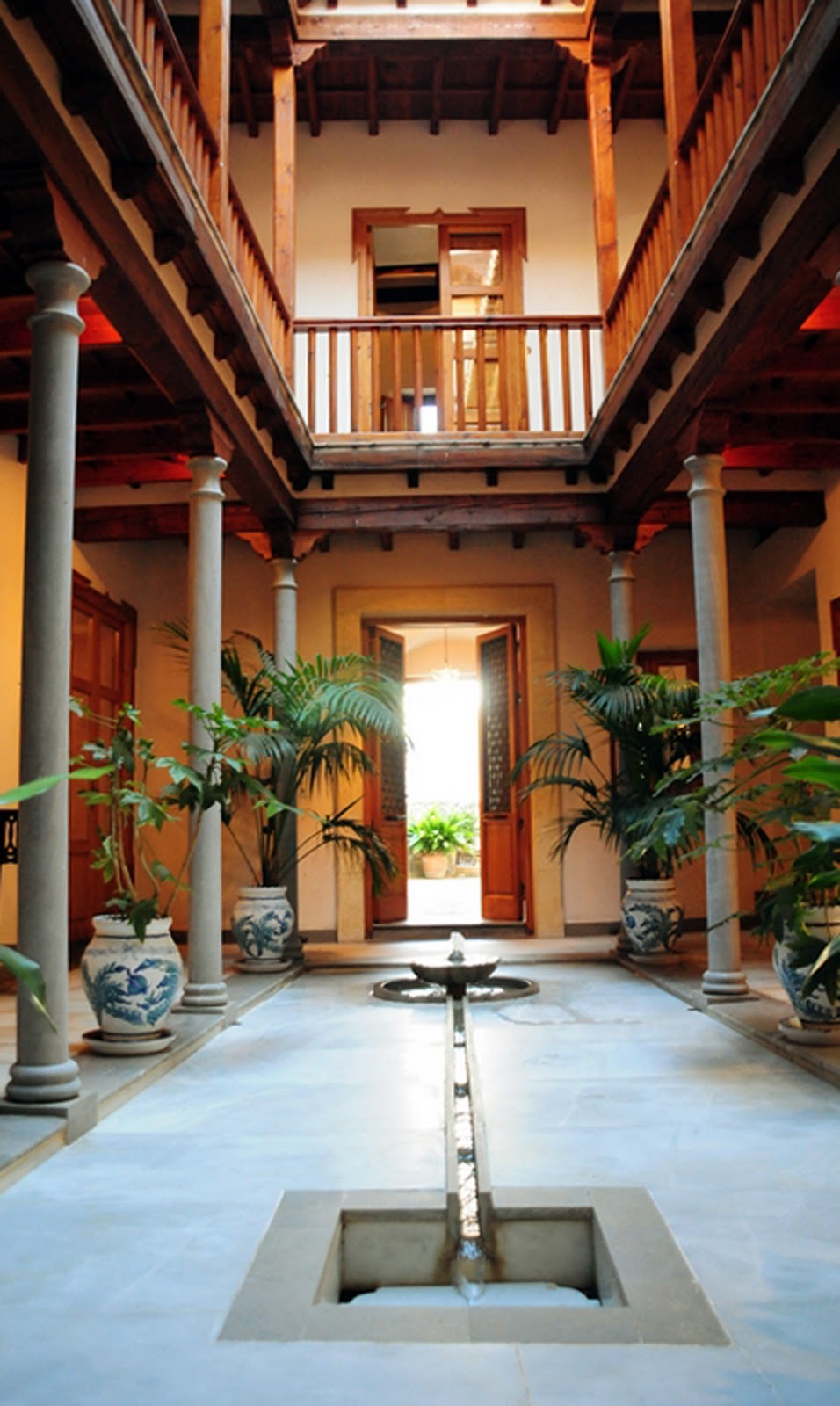 Reminds me of old indian houses built mandatorily with courtyards ...