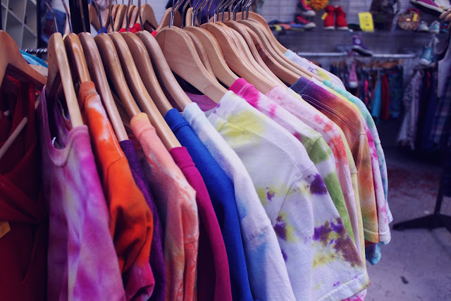 tie-dye t-shirts on a rack tie-dye t-shirts on a rack