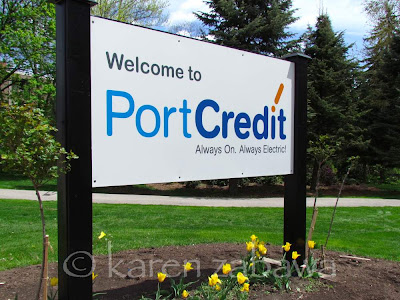 Welcome to Port Credit new sign at Godfreys Lane and Lakeshore Road West Mississauga. Sign at Godfreys Lane and Lakeshore Road West Port Credit Mississauga Ontario.