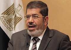 الرئيس محمد مرسي يتسلم رئاسة القمة الـ 12 لمنظمة التعاون الإسلامي لـ3 سنوات