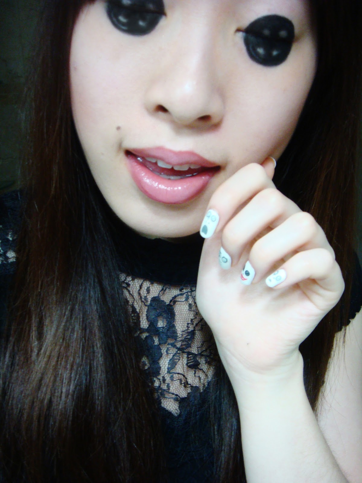 The Nail Artiste If a button nose is cute, why are button eyes creepy?