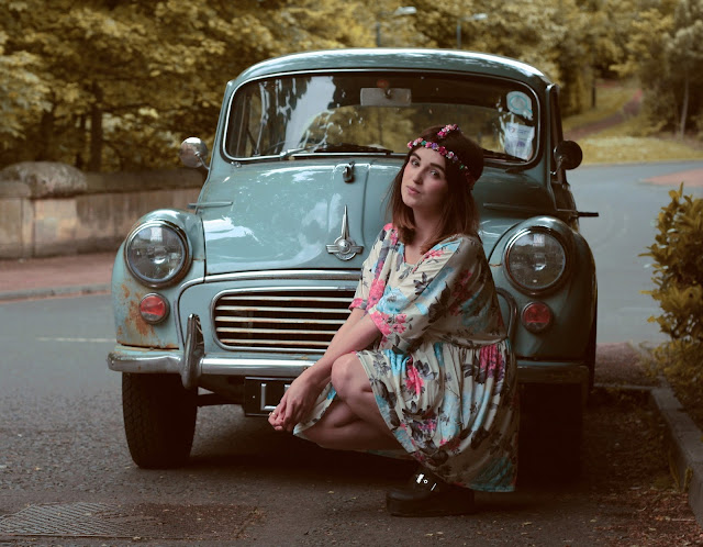 morris minor vintage car, hippy inspired vintage look, floral miss guided dress, perfect festival wear, styled with a hippy bohemian flower head chain. morris minor vintage car, hippy inspired vintage look, floral miss guided dress, perfect festival wear, styled with a hippy bohemian flower head chain.