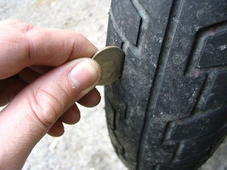 checking motorcycle tire tread