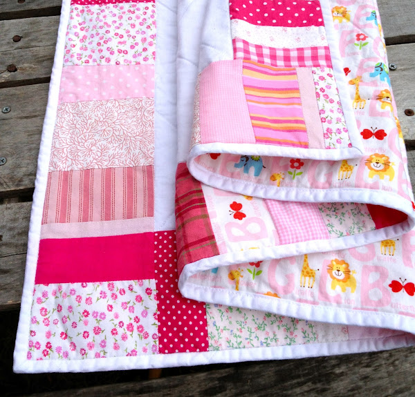 Made with all pink fabrics around the border: