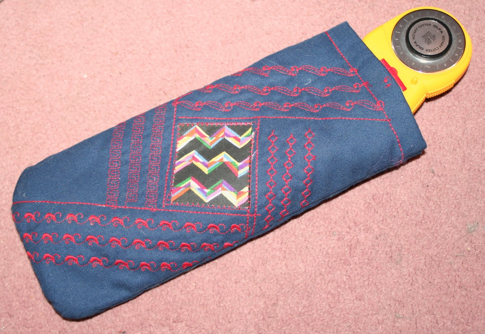 my evolution in bag making Rotary cutter pouch class taken at NEC