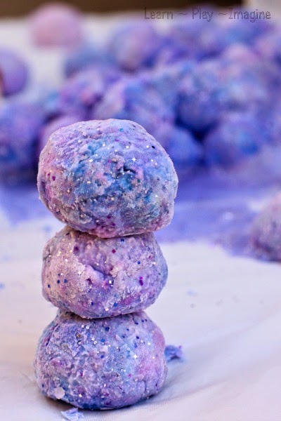 Building a snowman with FROZEN snowballs.  An erupting play recipe for all the FROZEN fans out there!