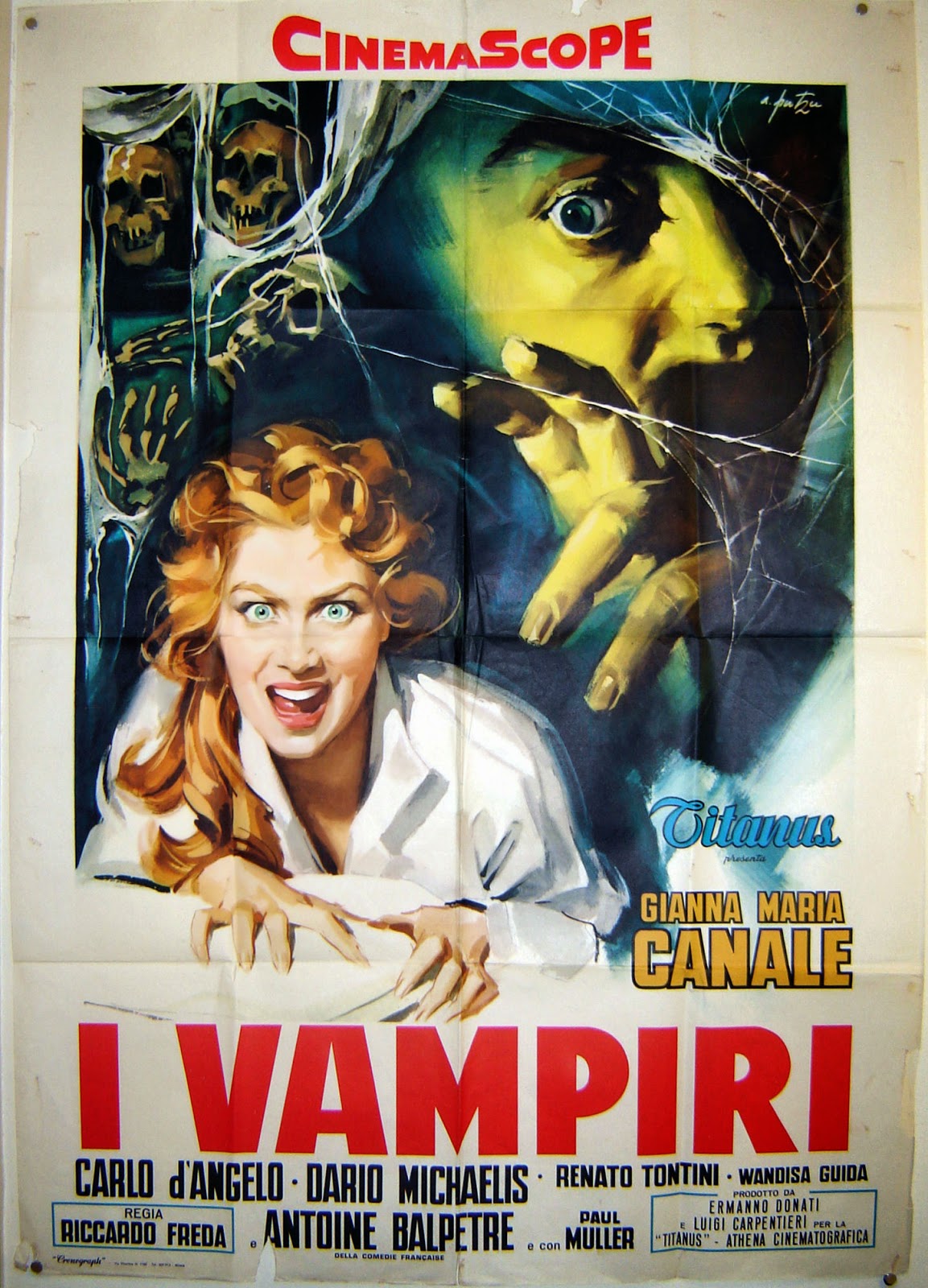 Italian Film Poster For I Vampiri, Lust Of The Vampire Italian Film Poster For Mario Bava's Lust Of The Vampire with stunning female vampire in the foreground and a spooky man grasping for her in the background.