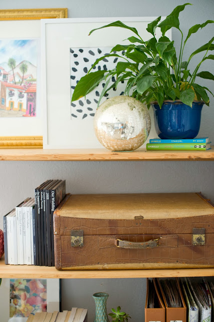 Styling a shelving unit that is both pretty and functional.
