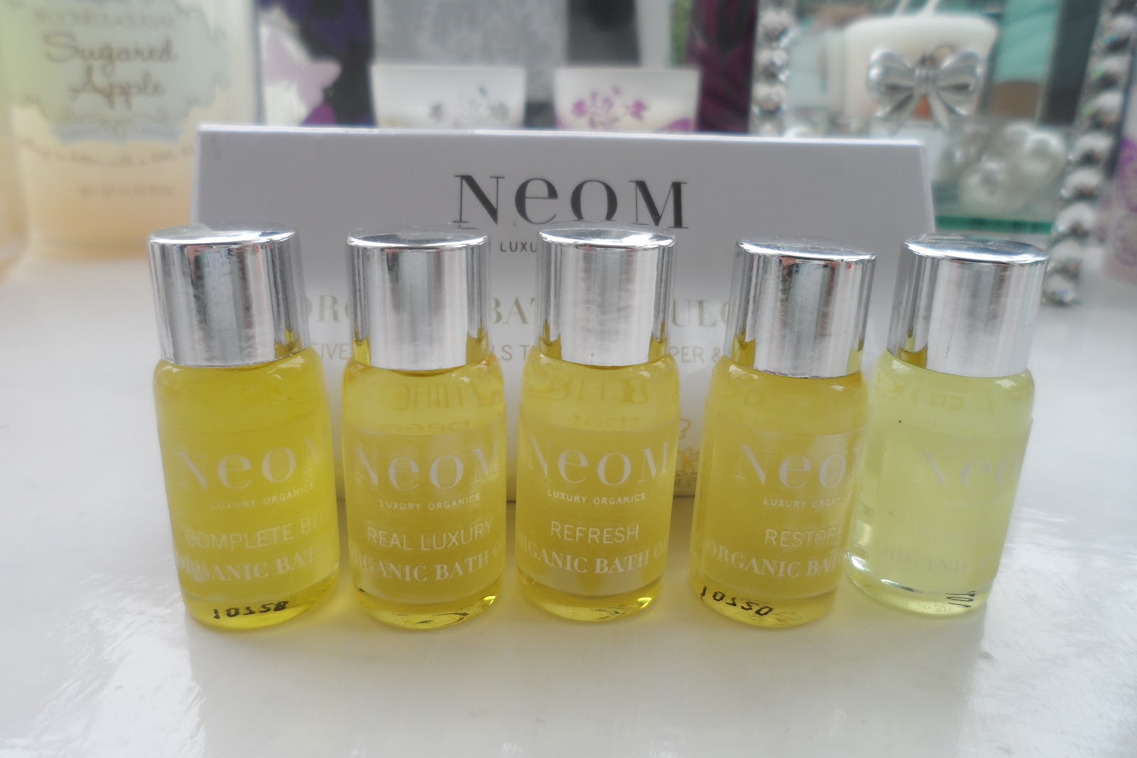 Neom real luxury candle and mini bath oils review flutter and sparkle