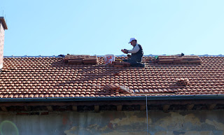 The chimney pokes through the roof The chimney pokes through the roof