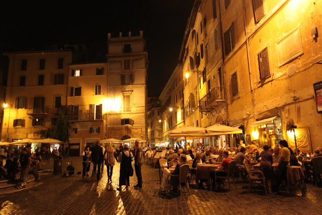 A restaurant is located nearby the Fontana del Pantheon and the Pantheon in Rome, Italy A restaurant is located nearby the Fontana del Pantheon and the Pantheon in Rome, Italy