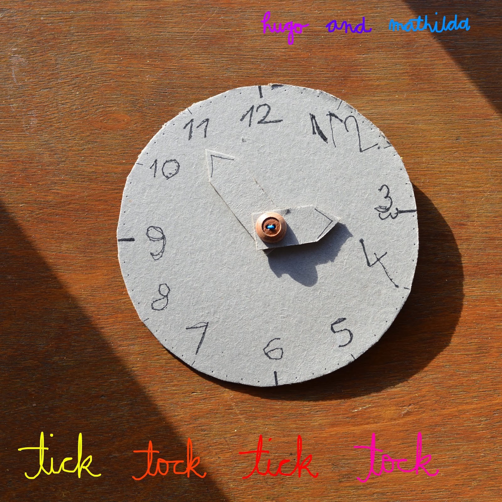 The time is flying when we're having fun playing with this cardboard clock