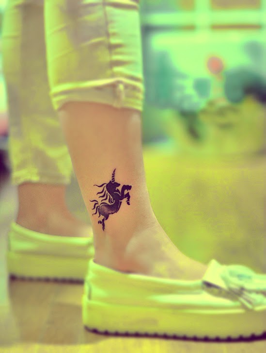 unicorn tattoo on the ankle