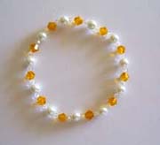 7.5" Yellow Swarovski & Pearl Bracelet $30.00