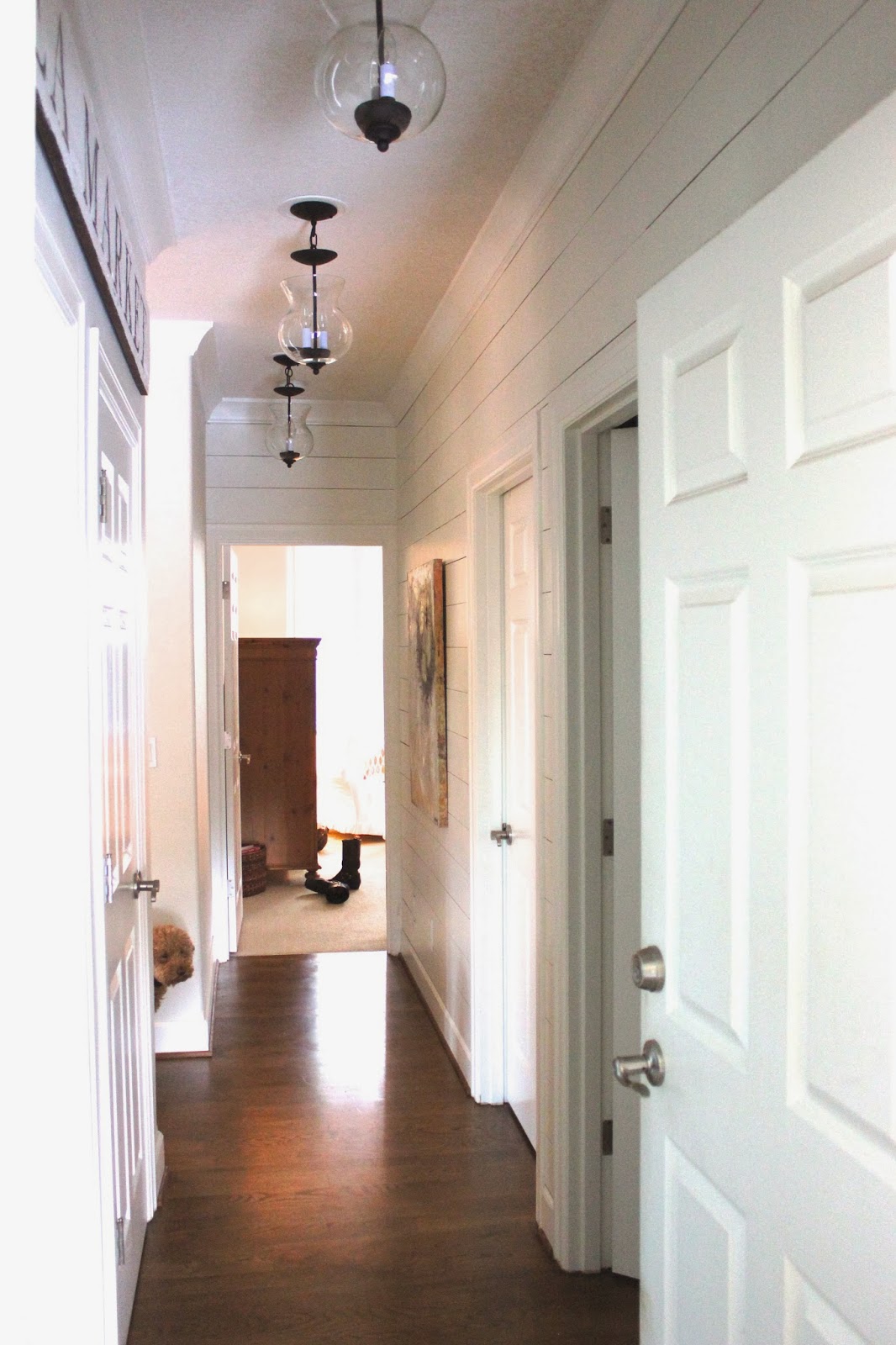 planked wall hallway gets new light fixtures forever cottage planked wall hallway gets new light fixtures forever cottage
