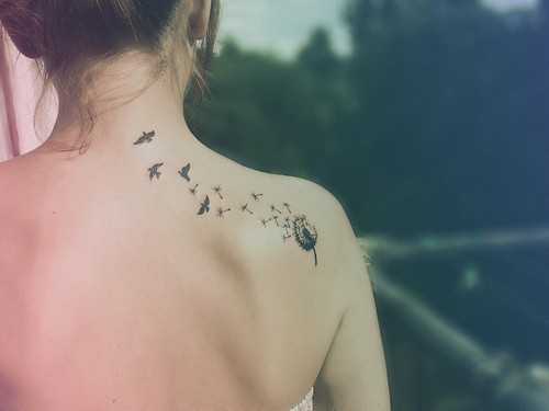 Small Bird Tattoo On Back