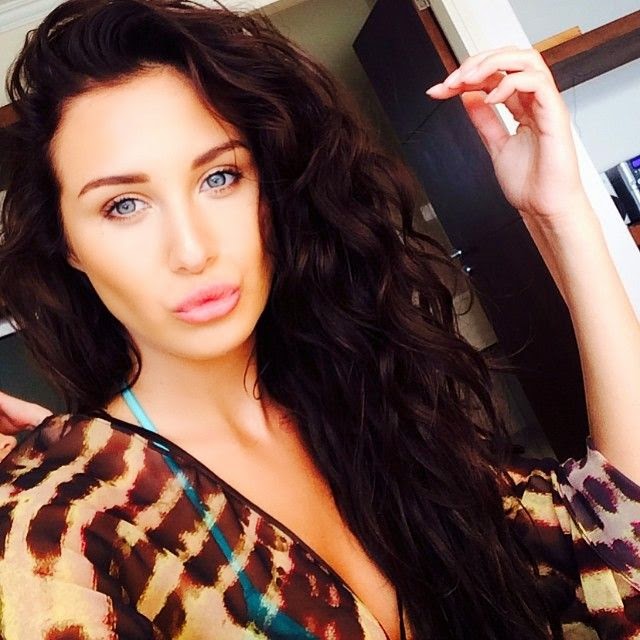 Chloe Goodman lets her natural Bikini beauty shine on vacation in Malaga, Spain In the alright and natural pose, the stunning beauty, Chloe Goodman was joined with her sister as they lounged by a hotel pool in Malaga, Spain on Sunday, May 23, 2014.