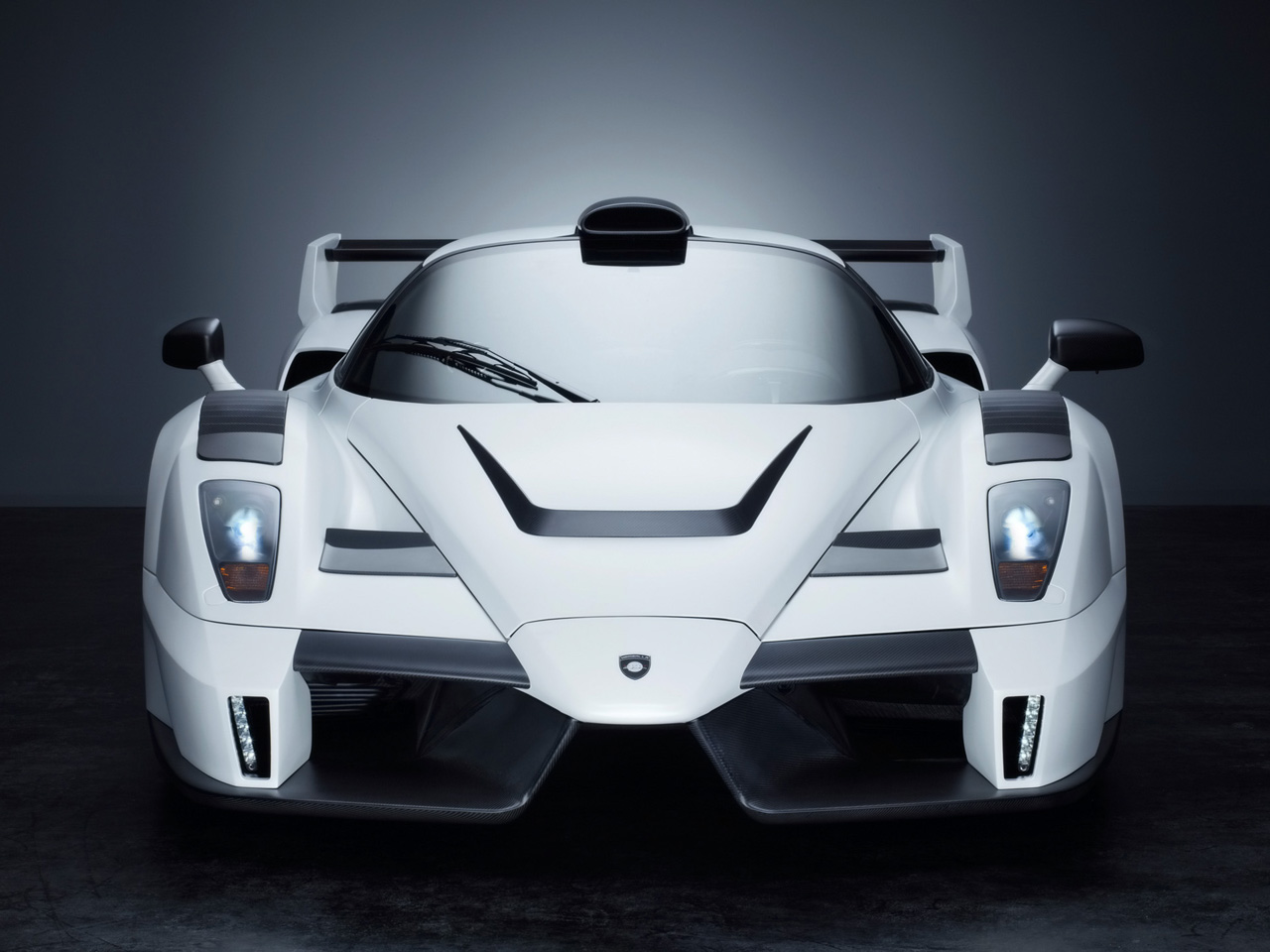 http://4.bp.blogspot.com/-GFzTodFHuWg/TkYpZw08y_I/AAAAAAAAADk/IsnPKTyfgAA/s1600/2010-gemballa-mig-ui-ferrari-enzo-2.jpg