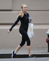 Amanda Seyfried in black jogging outfit