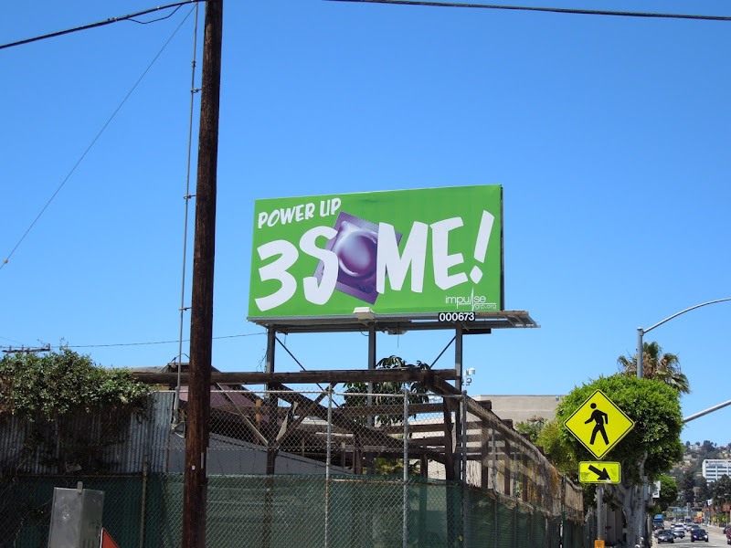 Power Up 3Some condom billboard 3Some condom billboard