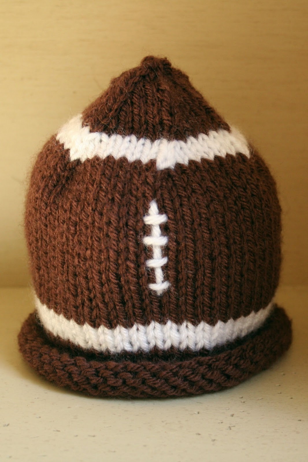 A Knit Football Baby Hat Dukes and Duchesses