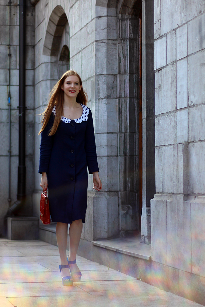Retro fashion blogger outfit with a vintage Mary Poppins coat worn as a dress