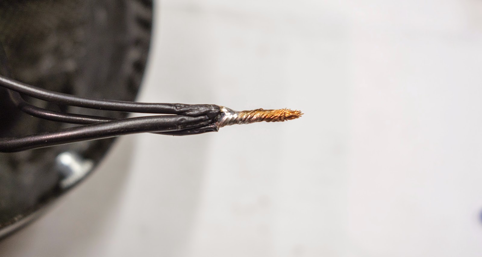 Three earth wires twisted and lightly soldered to form a good connection