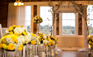 Wedding rings on yellow flowers - Kent Buttars, Seattle Wedding Officiant Yellow flowers and wedding rings - Kent Buttars, Seattle Wedding Officiant