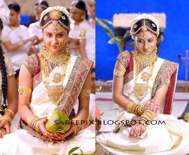 Tolly actress bhanu mehra in white silky bridal saree from varudu film bhanu sri mehra in white silk bridal saree
