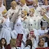 Fans wear KKK hoods thumbnail
