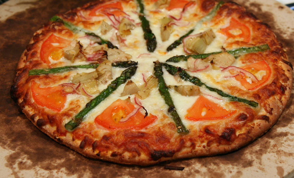 Bruce's Kitchen Asparagus, Artichoke, Tomato, Red Onion Pizza