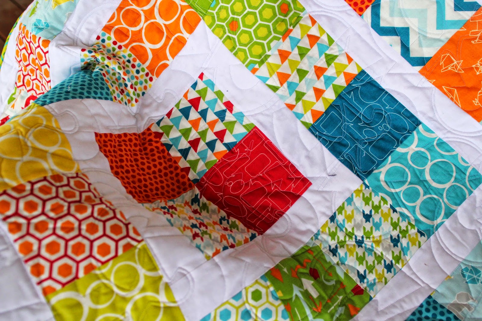 Around the world baby quilt made with charm packs