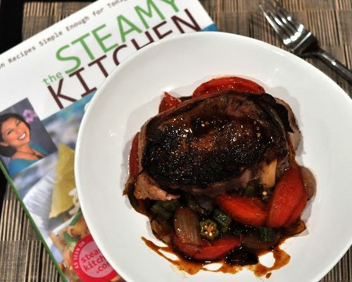 Steak and Tomatoes, ribeyes pan-seared and finished in oven on a delicious bed of tomatoes, onions, late-summer vegetables.