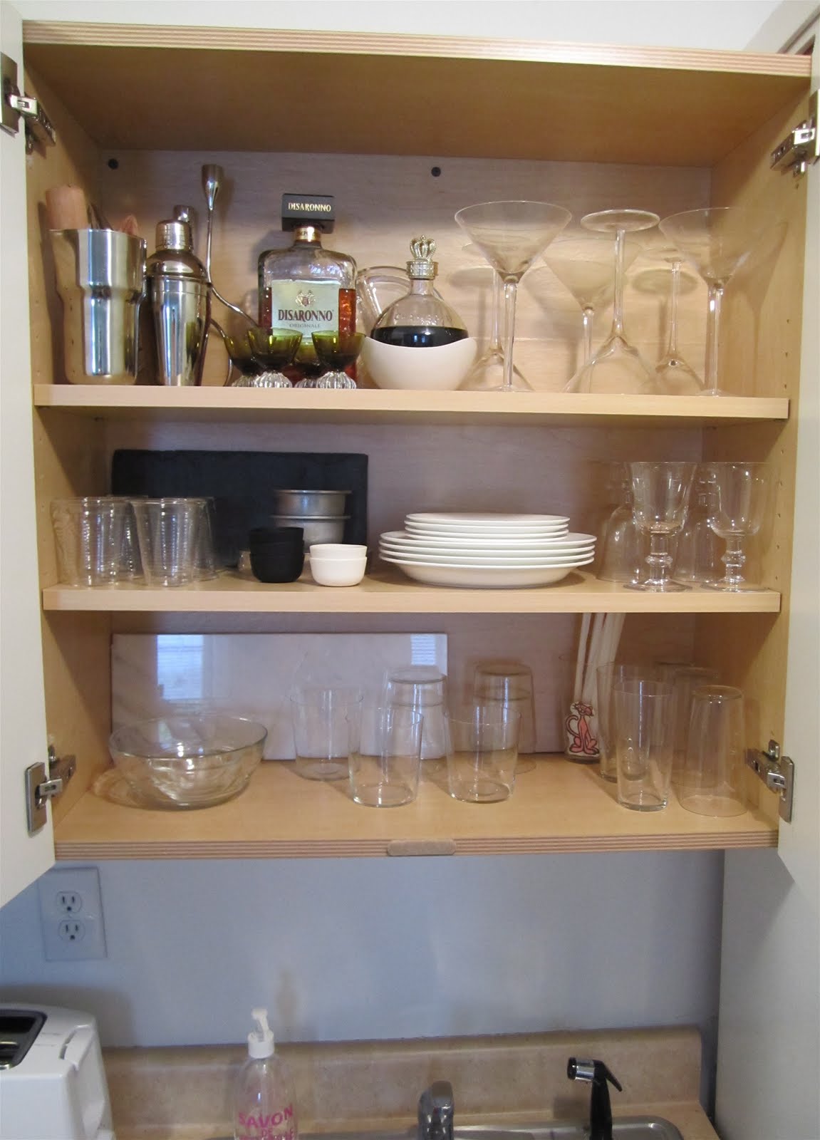 Glass door kitchen cabinets Upper Cabinets Over Kitchen Sink