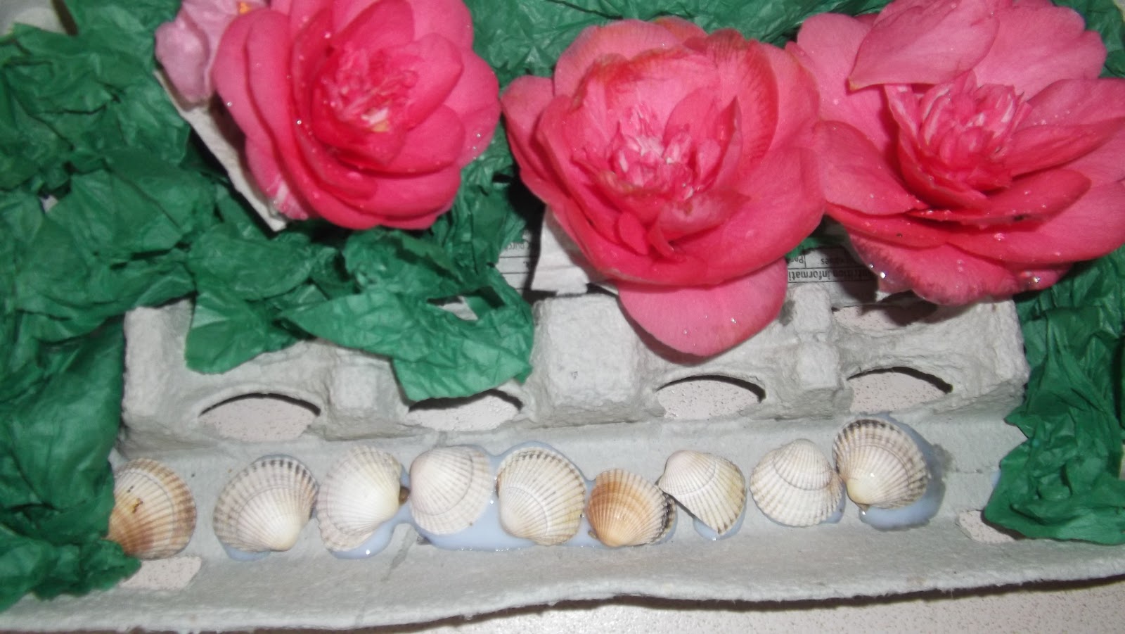 delivering grace Garden world using an egg carton