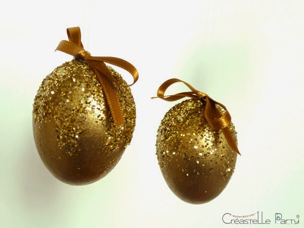 œufs décorés à paillettes suspendus