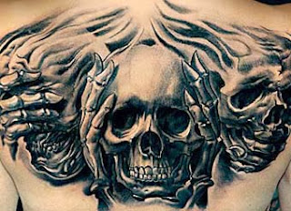 Fotos de tattoos de caveira nas costas