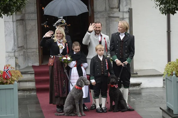 Crown Prince Haakon of Norway and Crown Princess Mette-Marit of Norway with Princess Ingrid Alexandra, Prince Sverre Magnus and Marius Borg Høiby greet the Childrens Parade on the Skaugum Estate 