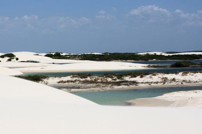 The Lencois Maranhenses National Park Brazil (Parque Nacional dos Lençóis Maranhenses) is located in Maranhão state, in northeastern Brazil, just east of the Baía de São José, between 02º19’—02º45’ S and 42º44’—43º29’ W. It is an area of low, flat, occasionally flooded land, overlaid with large, discrete sand dunes. It encompasses roughly 1500 square kilometers, and despite abundant rain, supports almost no vegetation. The park was created on June 2, 1981. It was featured in the Brazilian film The House of Sand. Most recently, it was featured in the song "Kadhal Anukkal" from the Indian film, Enthiran.