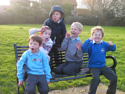 group of schoolchildren pulling faces