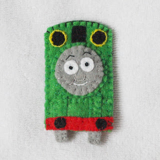 Percy felt finger puppet handmade by Joanne Rich for her friends daughter.