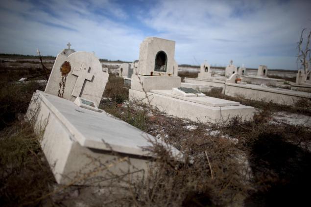 Tombs lay in the ruins of Epecuen, 25 years after the lake overflowed. Water burst through a retaining wall and submerged the lakeside streets in 10 meters of water.
